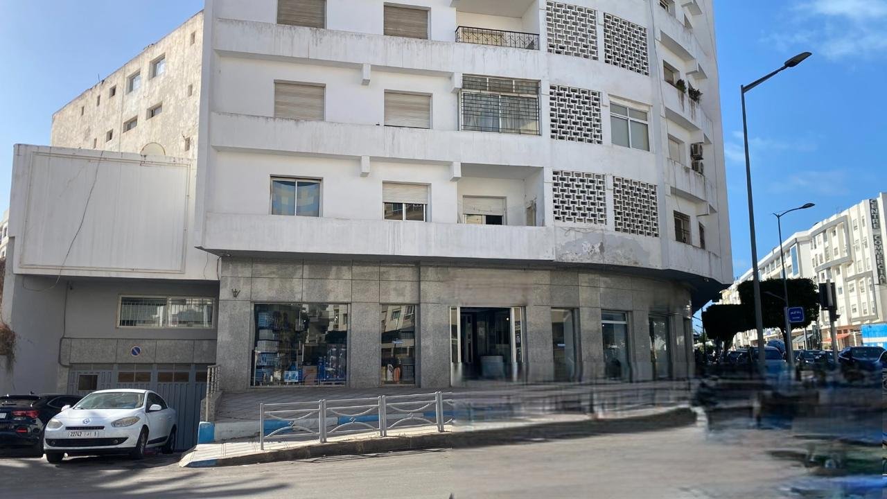 Façade courbe du RDC commercial, Rabat Océan